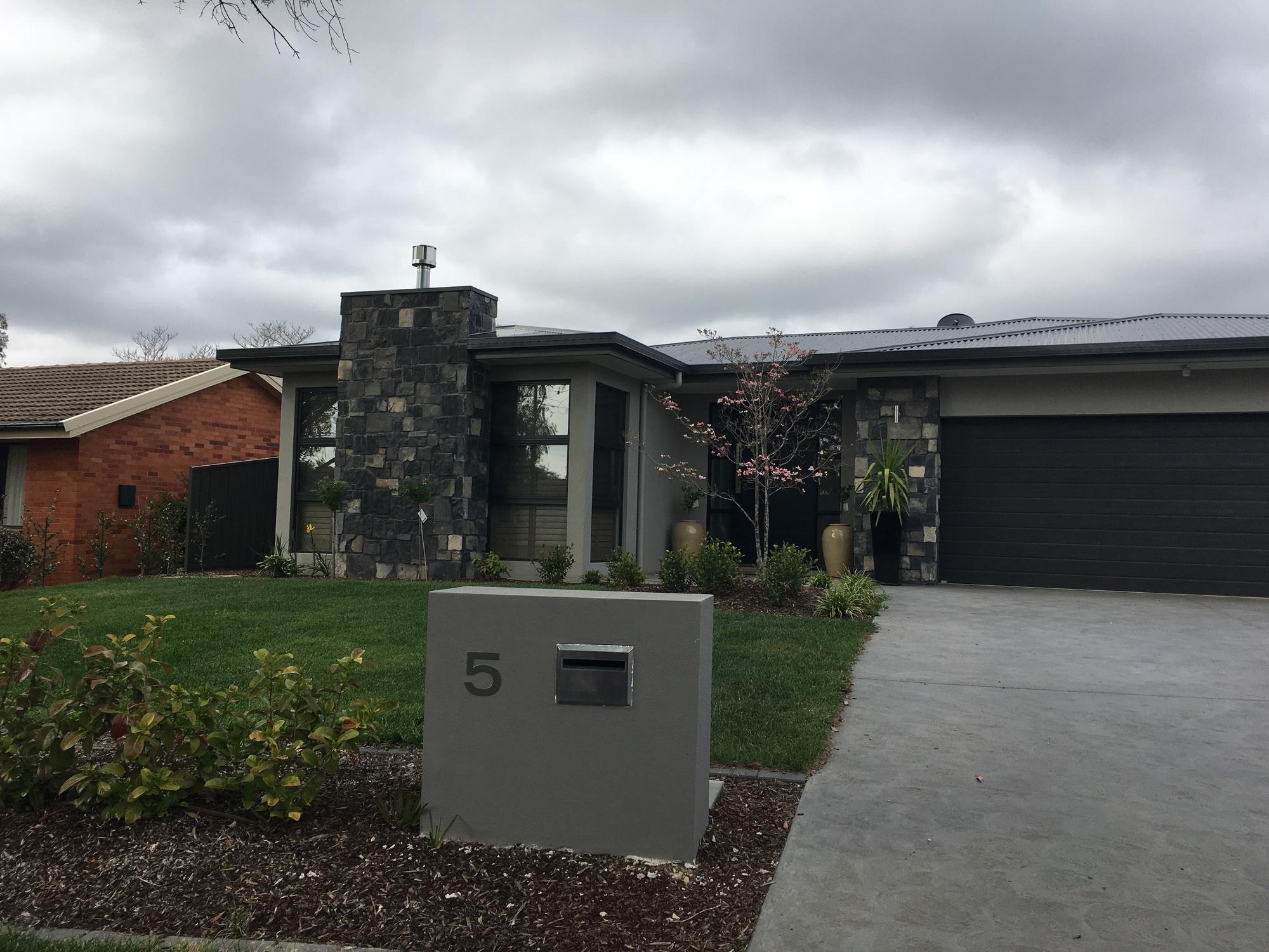 Georgina from CURTIN, ACT loves COLORBOND® steel.  Roofing, Guttering & Fascia, Fencing made from COLORBOND® steel in colours Monument® and Wallaby®