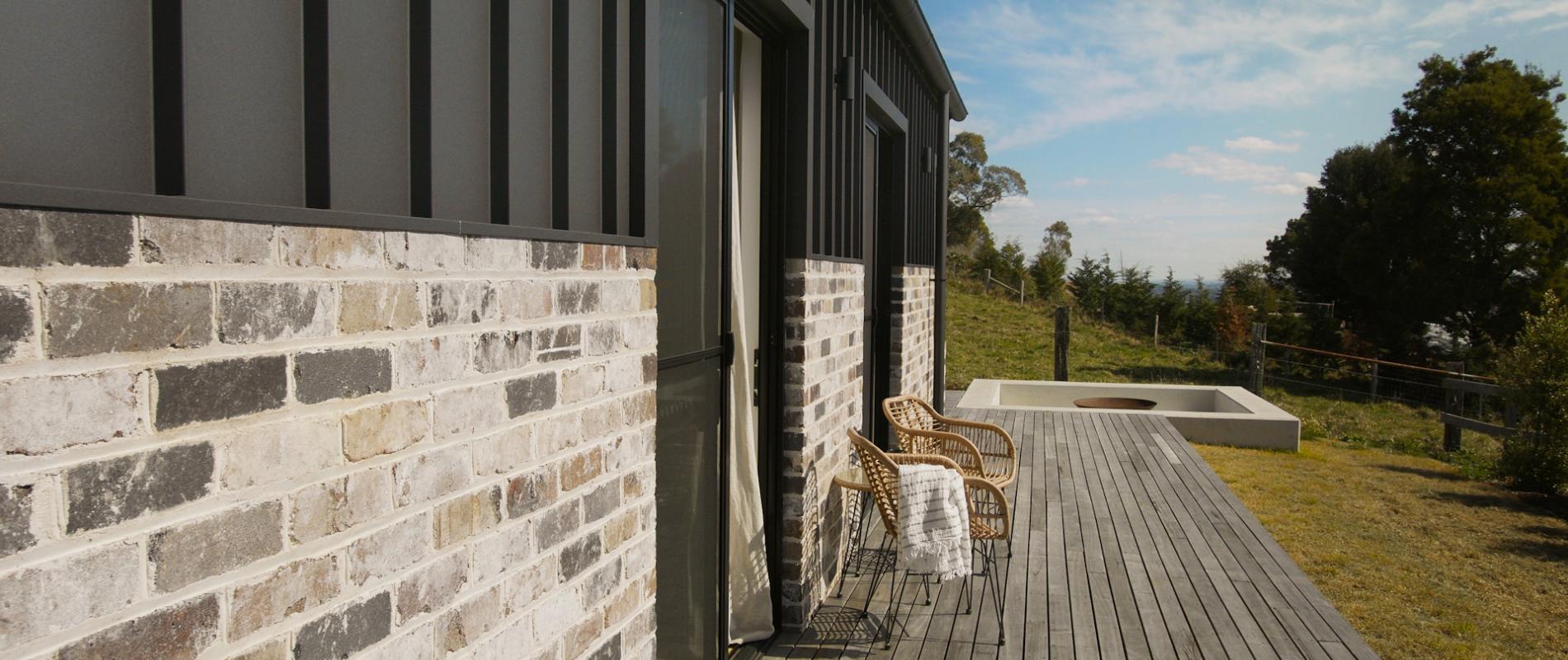 The Barn, Glenquarry NSW, designed by Solis Haus Building Design. Roofing and Walling made from COLORBOND® steel in colour Monument® Matt