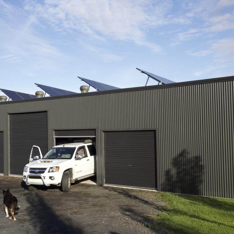 Gym Shed Cambewarra NSW, made from COLORBOND® steel in the colour Woodland Grey® on the Walls, Monument® Doors and Trim