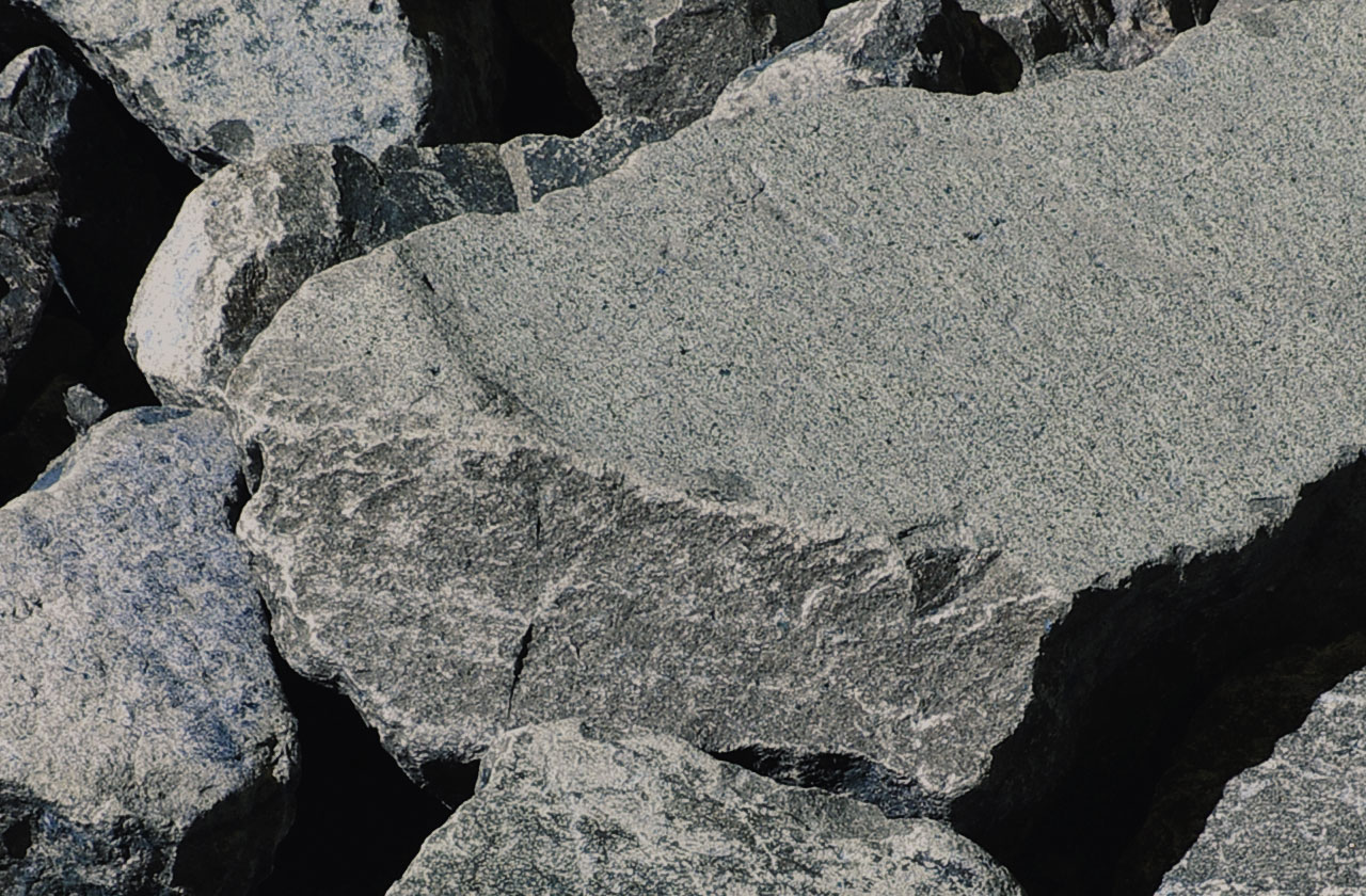 COLORBOND® steel in the colour Basalt®. Grey basalt rocks.