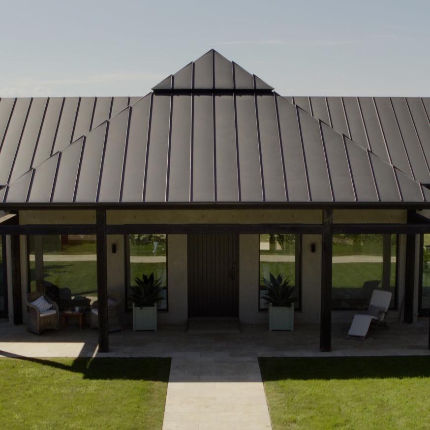 Reid House.  Roofing made from COLORBOND® steel in colour Monument® in a standing seam profile.