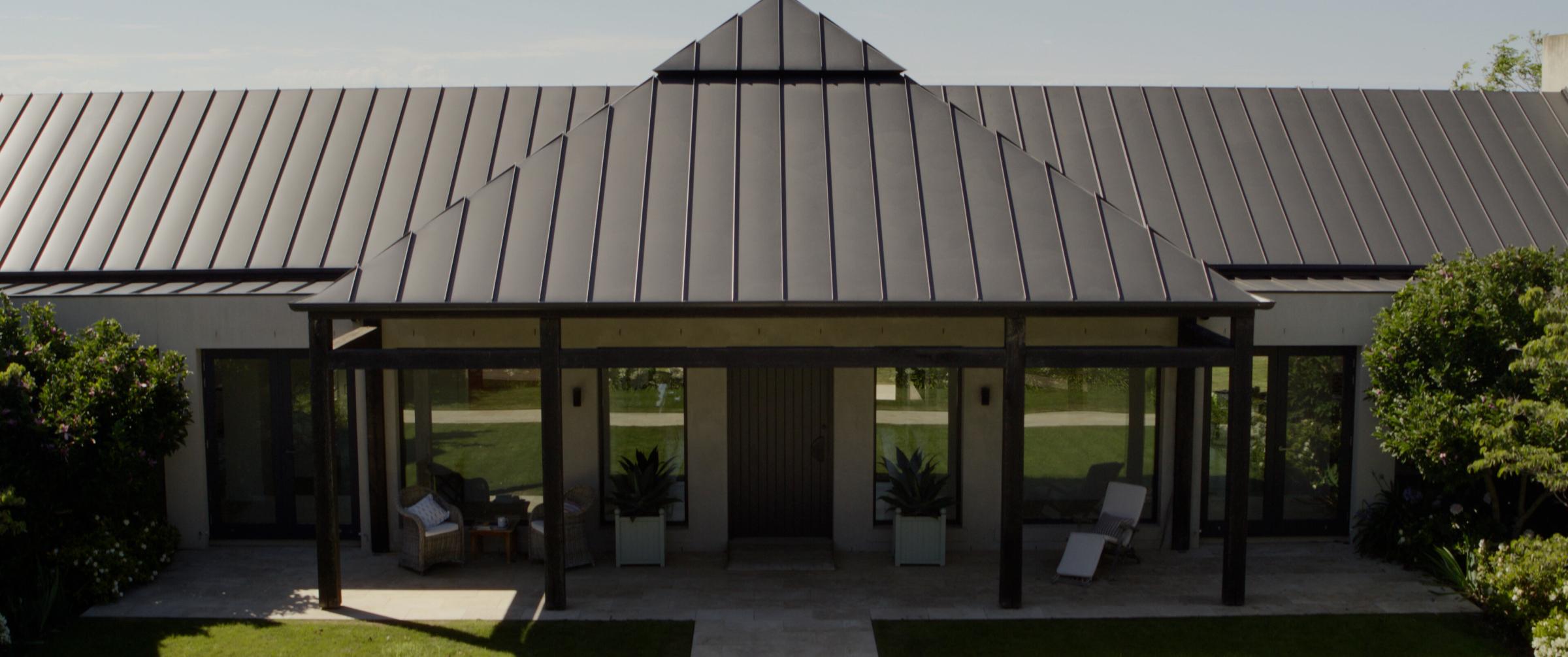 Reid House. Roofing made from COLORBOND® steel in colour Monument® in a standing seam profile.