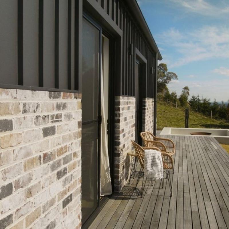 The Barn, Glenquarry NSW, designed by Solis Haus Building Design.  Roofing and Walling made from COLORBOND® steel in colour Monument® Matt