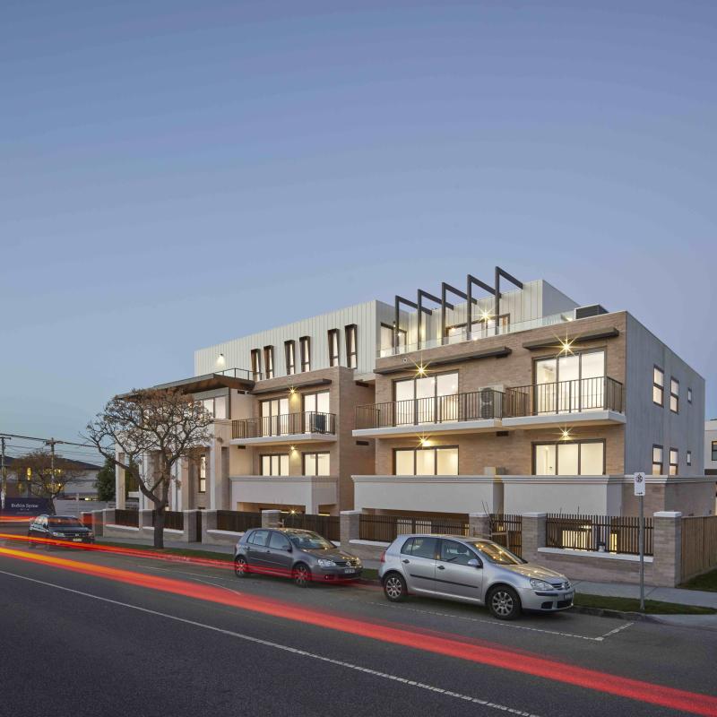 Apartment building located in VIC and designed by C. Kairouz Architects. Features interlocking panels in COLORBOND® steel Surfmist® for the cladding. Photographer is Peter Clarke.