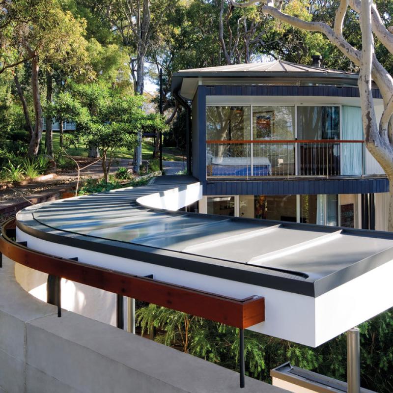 Home at  Palm Beach. on Sydney’s Northern Beaches. Roofing, Flat sheet made from COLORBOND® steel in the colour Woodland Grey®. Tanner Architects