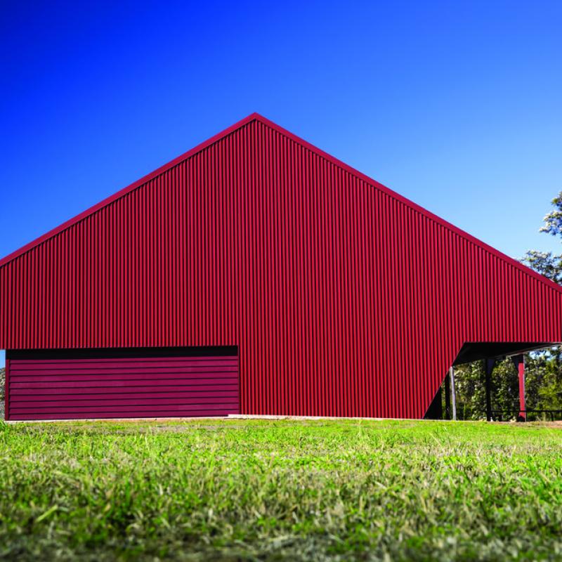 COLORBOND® steel Manor Red® in Apex Apspan 700 profile and Stramit® Corrugated profile. 