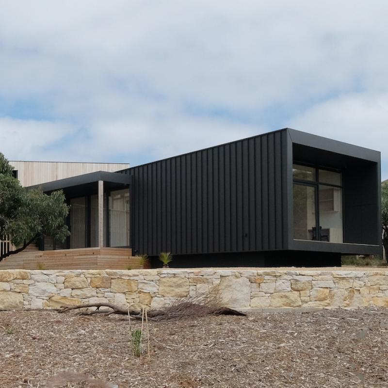 COLORBOND® steel Monument® Matt roofing and cladding in LYSAGHT ENSEAM® profile.