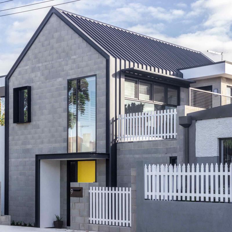 Dollhouse 2.0' by Aura Design Studio. The home is roofed and partially clad in COLORBOND® steel Matt in the colour Monument®.