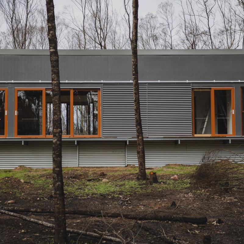 The house that withstood a bushfire. Uses framing made from TRUECORE® steel, COLORBOND® steel cladding, roofing, fire shutters and flashing