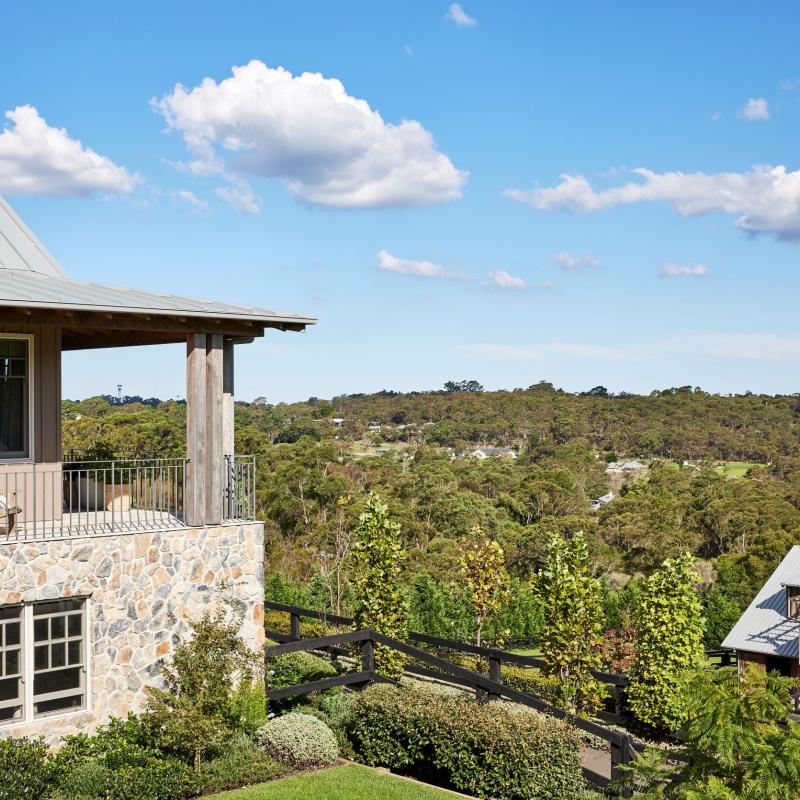 Home with COLORBOND steel roof in Windspray surrounded by bushland