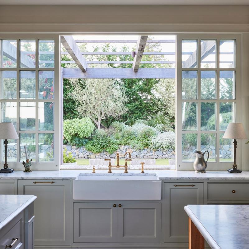 Farmhouse kitchen with window looking out onto garden