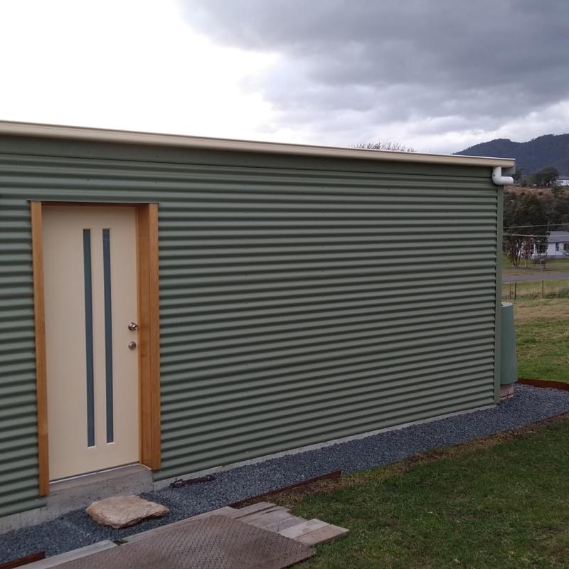 Sue from Fingal, TAS loves COLORBOND® steel. Roofing, Guttering & Fascia, Walling made from COLORBOND® steel in colour Classic Cream™ and Pale Eucalypt®