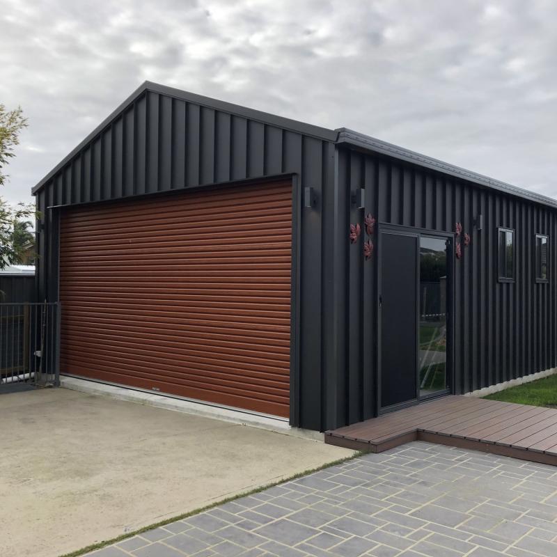 Naomi from Rosedale, VIC loves COLORBOND® steel. Garage Doors, Sheds made from COLORBOND® steel in colour Monument® Matt