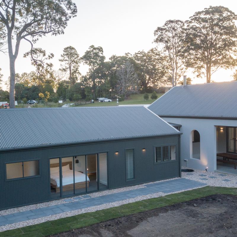 Belinda from Glenview, QLD loves COLORBOND® steel. Roofing, Guttering & Fascia, Garage Doors, Walling made from COLORBOND® steel in colour Woodland Grey®