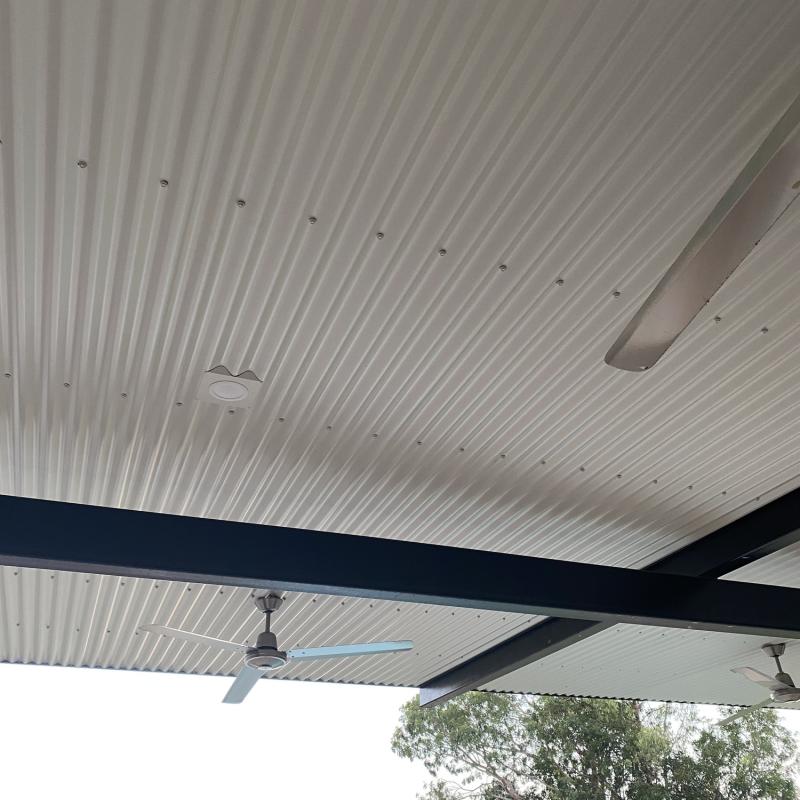 Sharon from Howard Springs, NT loves COLORBOND® steel. Patio and pergola made from COLORBOND® steel in Surfmist®