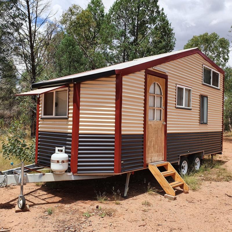 Judi from Dubbo, NSW loves COLORBOND® steel. Mobile tiny house Roofing, Guttering & Fascia, Walling cladding made from COLORBOND® steel in colours Classic Cream™, Manor Red® and Monument®