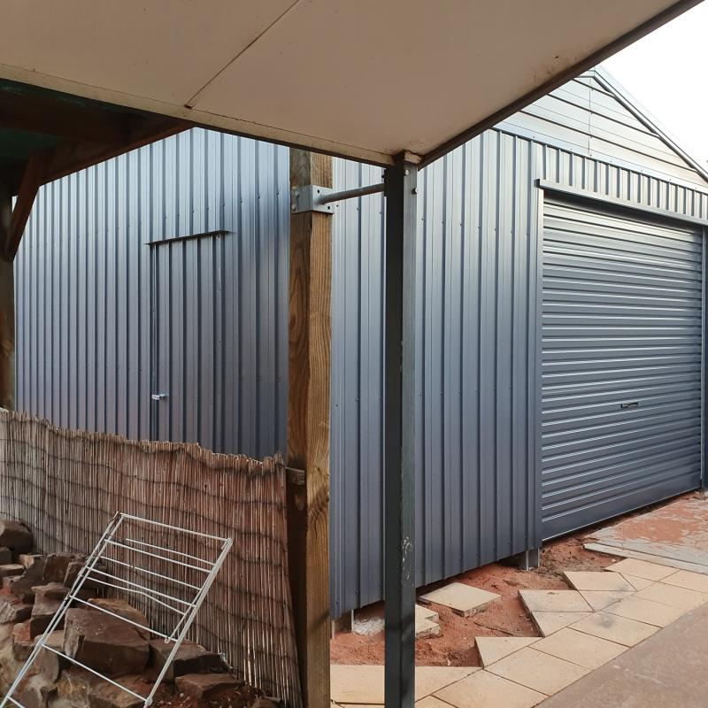 Leanne from Roxby Downs, SA loves COLORBOND® steel. Fencing, Sheds made from COLORBOND® steel in colour Ironstone®