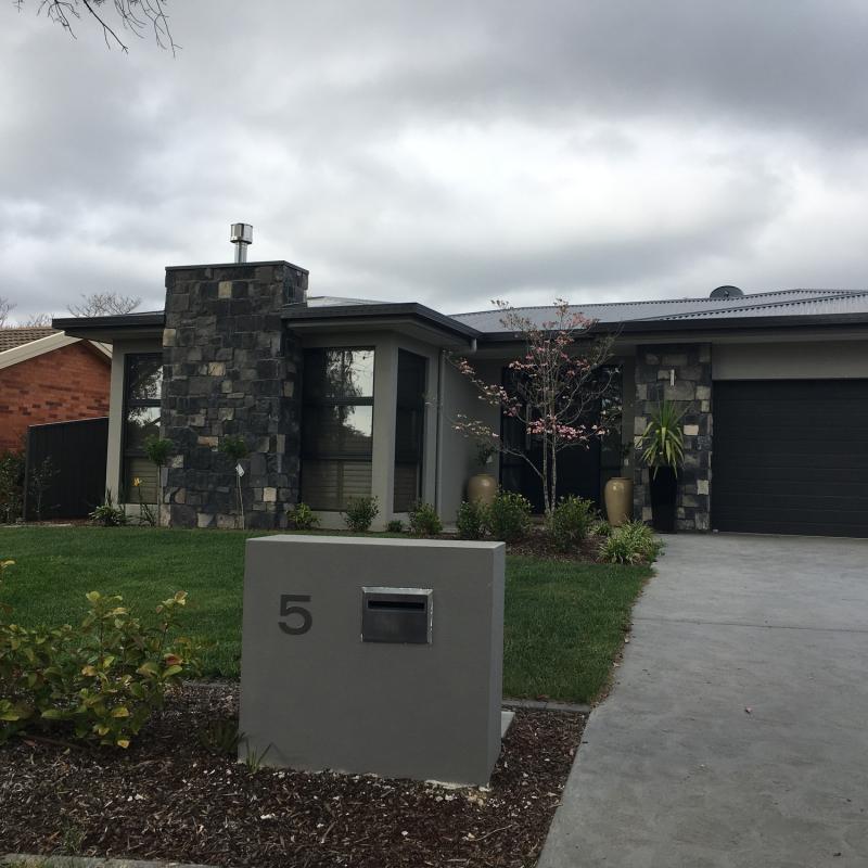 Georgina from CURTIN, ACT loves COLORBOND® steel.  Roofing, Guttering & Fascia, Fencing made from COLORBOND® steel in colours Monument® and Wallaby®