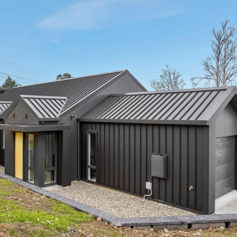 Louise from Glenorchy, TAS loves COLORBOND® steel. Roofing, Guttering & Fascia, Walling made from COLORBOND® steel in Monument® and Monument® Matt