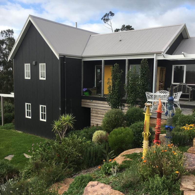 Peter from Yarragon, VIC loves COLORBOND® steel. Off grid house clad in COLORBOND® steel colour Monument® and Dune®