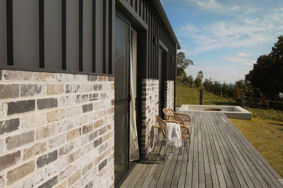 The Barn, Glenquarry NSW, designed by Solis Haus Building Design.  Roofing and Walling made from COLORBOND® steel in colour Monument® Matt