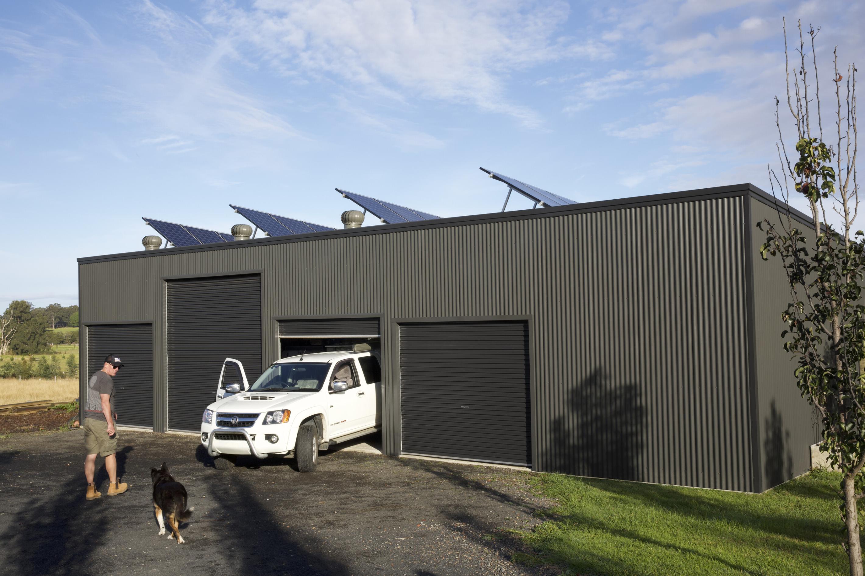 Gym Shed Cambewarra NSW, made from COLORBOND® steel in the colour Woodland Grey® on the Walls, Monument® Doors and Trim