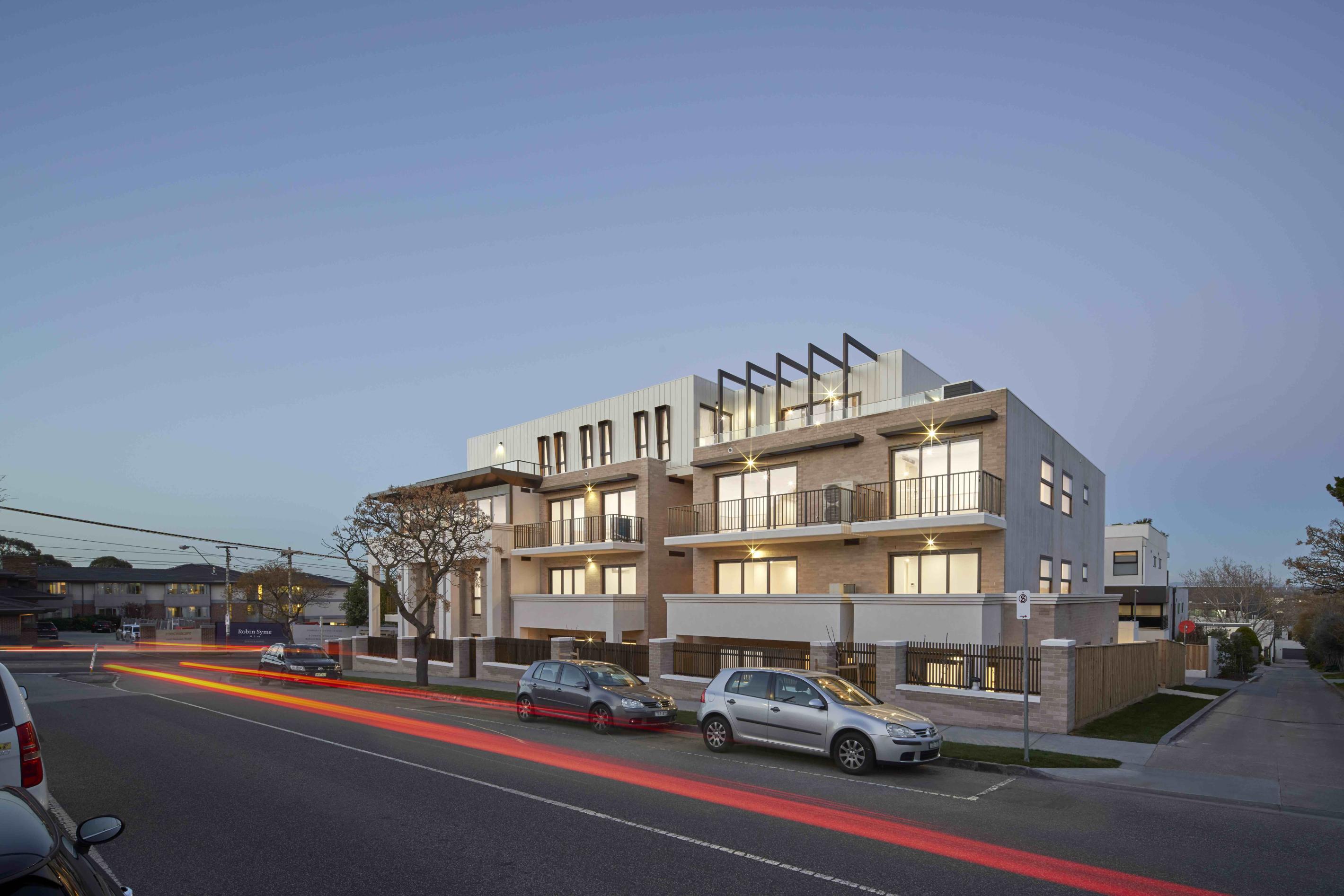 Apartment building located in VIC and designed by C. Kairouz Architects. Features interlocking panels in COLORBOND® steel Surfmist® for the cladding. Photographer is Peter Clarke.