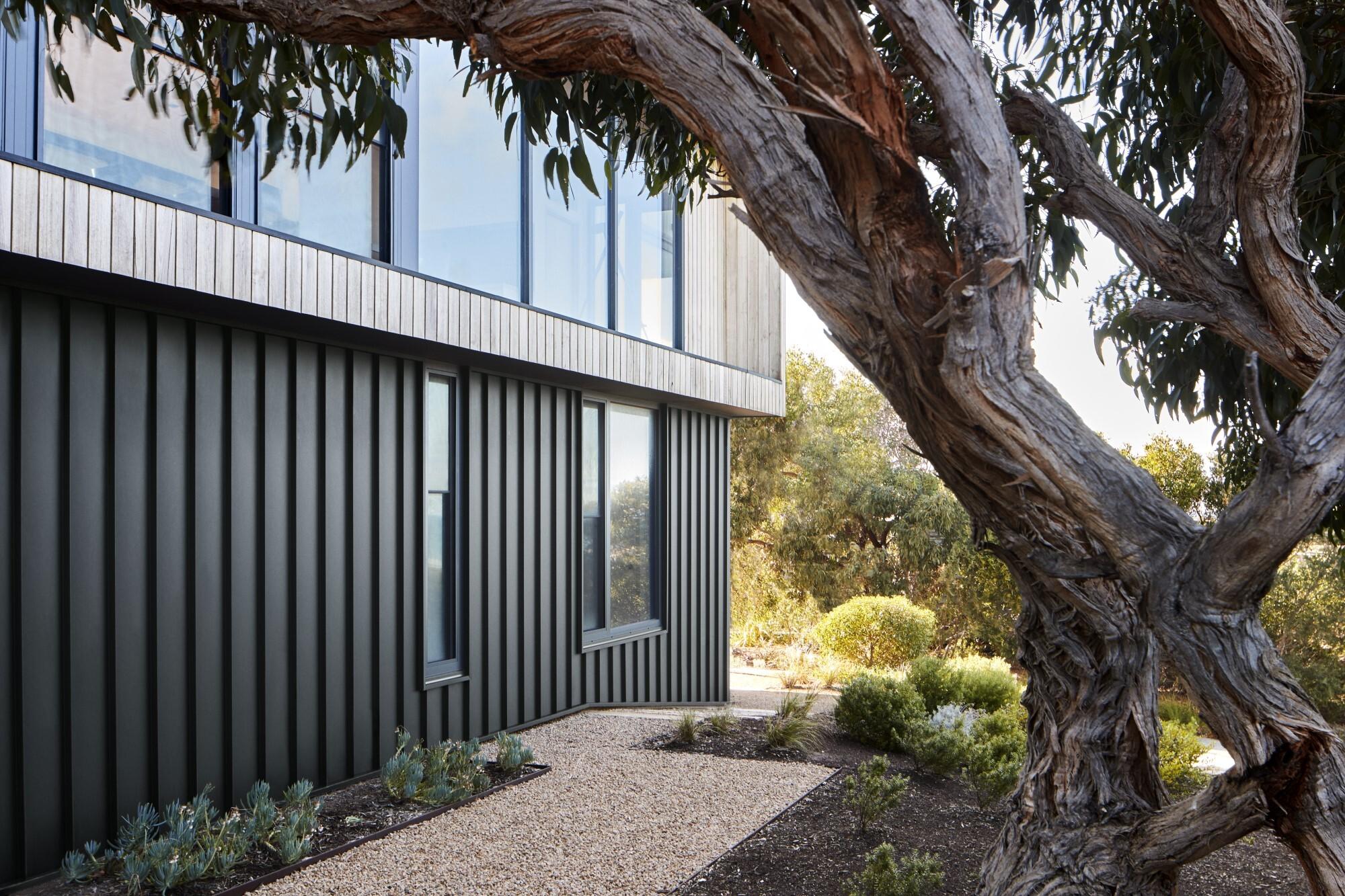 COLORBOND® steel Monument® Matt roofing and cladding. Architect: ITN Architects. Photo by Aidan Halloran. Builder: DBS Homes