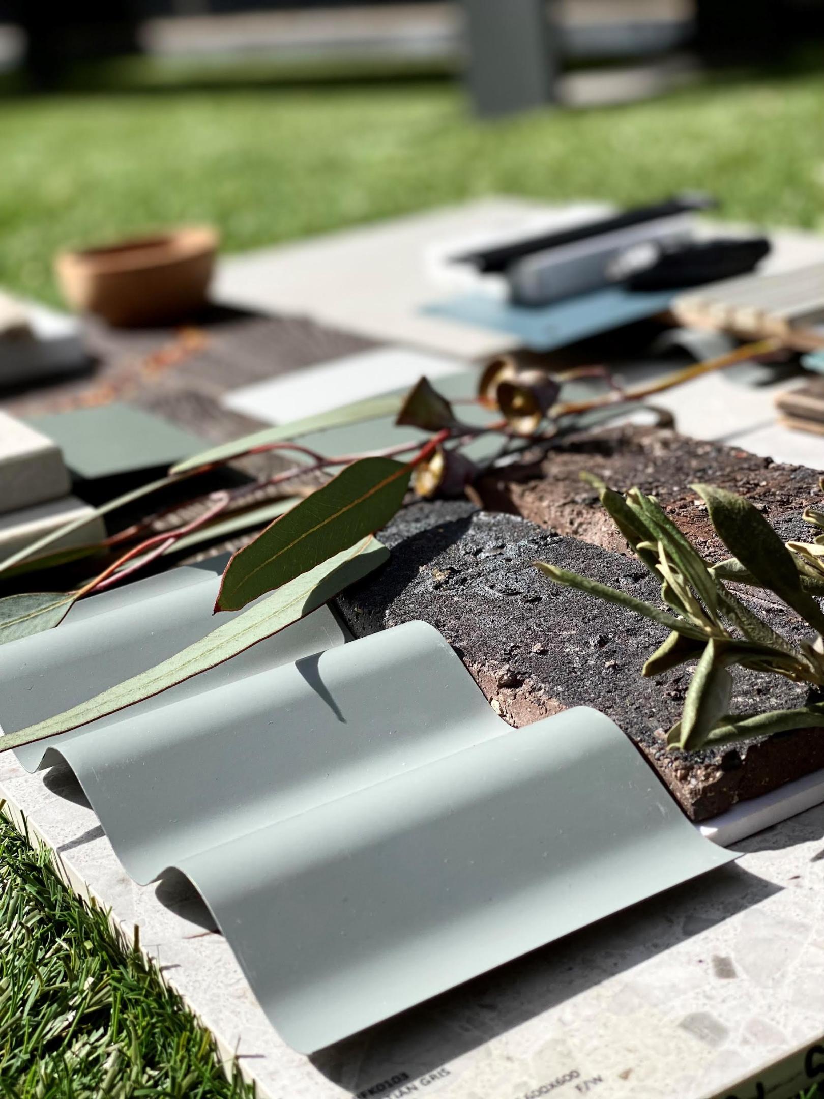 Flatlay incorporating COLORBOND® steel. Naturally inspired and evocative, these earthy mid tones pay tribute to our country’s quintessential palette and blend beautifully with the landscape. Photographer: Dean Peatling