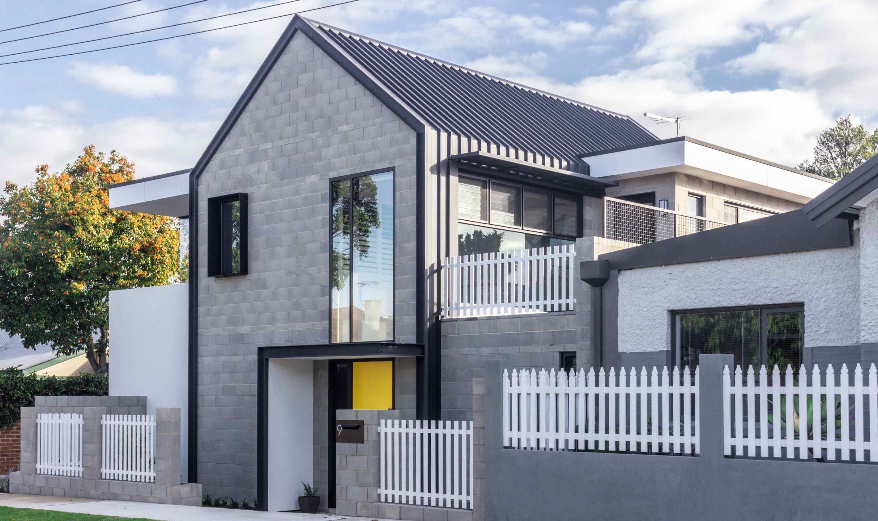 Dollhouse 2.0' by Aura Design Studio. The home is roofed and partially clad in COLORBOND® steel Matt in the colour Monument®.