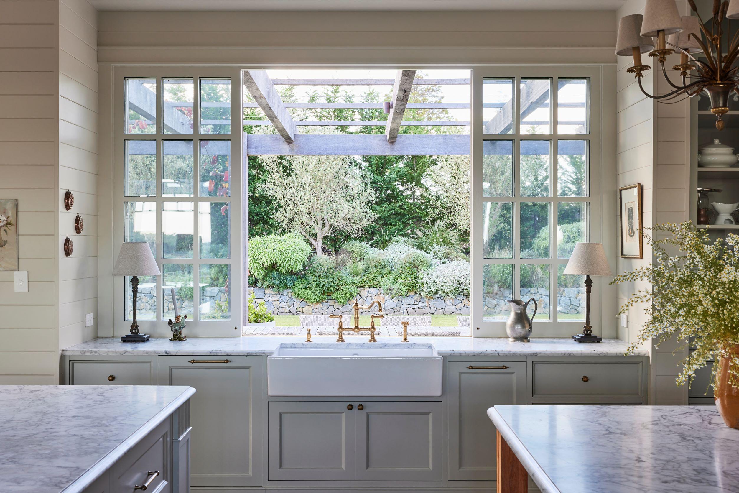 Farmhouse kitchen with window looking out onto garden