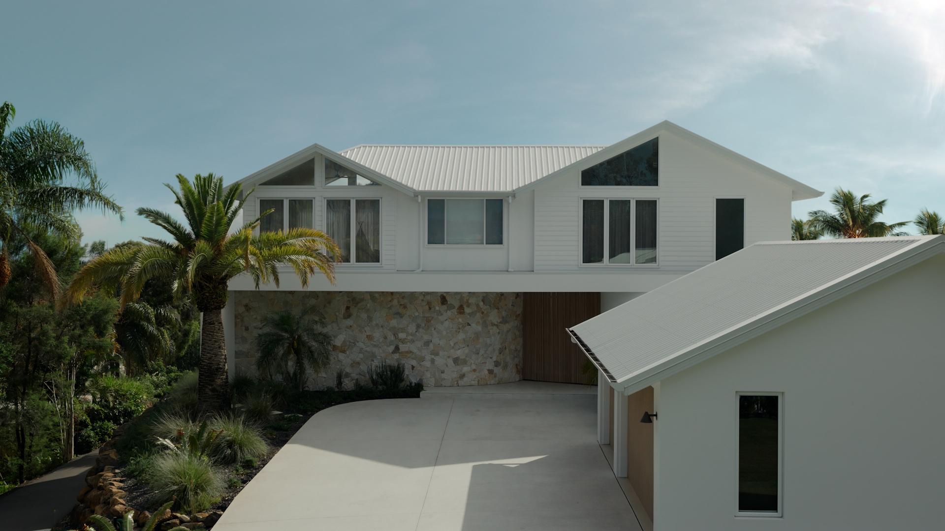 Palm Hill House, Reedy Creek QLD with COLORBOND® steel in Surfmist® in a classic finish.