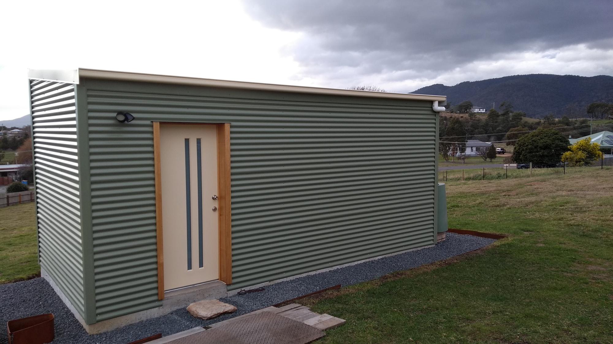 Sue from Fingal, TAS loves COLORBOND® steel. Roofing, Guttering & Fascia, Walling made from COLORBOND® steel in colour Classic Cream™ and Pale Eucalypt®