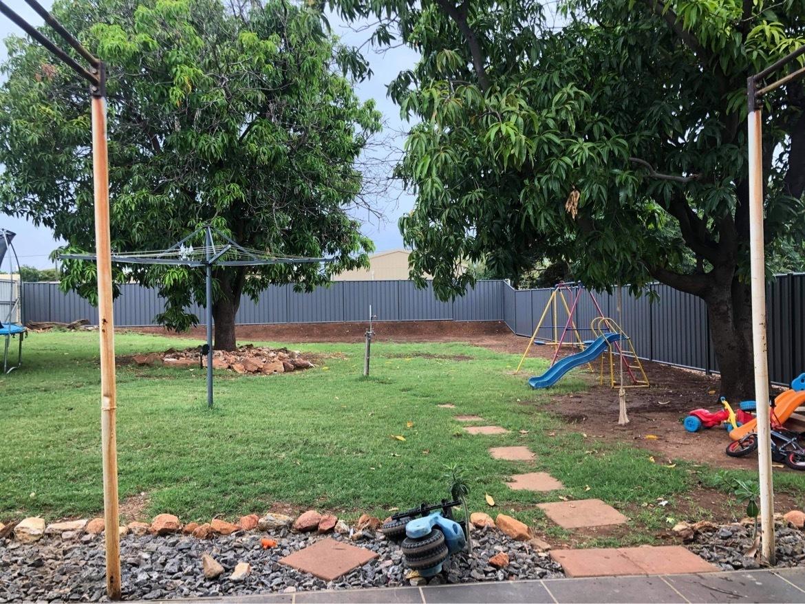 Samantha from Townview, QLD loves COLORBOND® steel, Fencing made from COLORBOND® steel in colour Basalt®