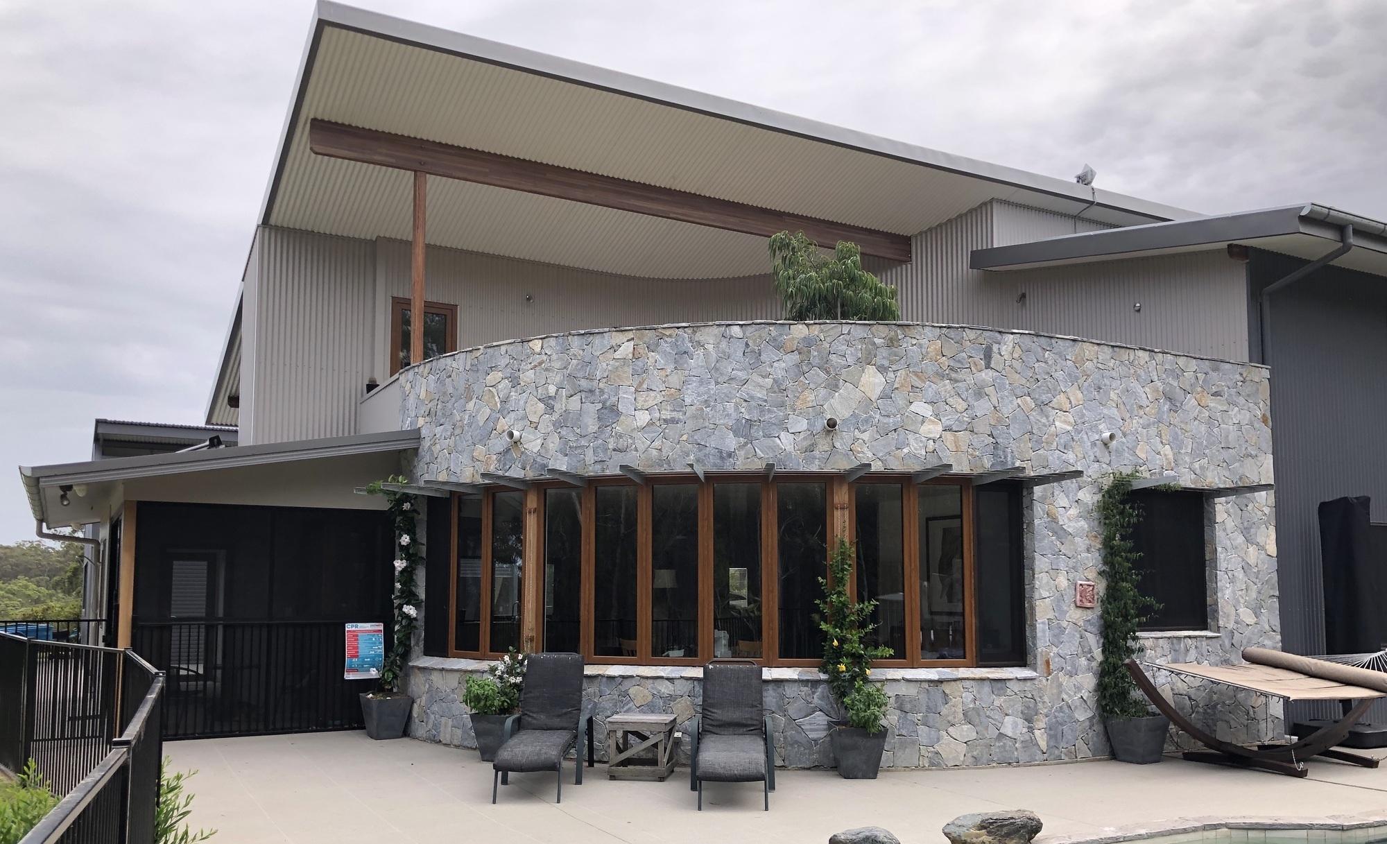 Guido from Bellingen, NSW loves COLORBOND® steel.  Roofing, Guttering & Fascia, Walling made from COLORBOND® steel in colours Basalt®, Shale Grey®, Surfmist® and Windspray®