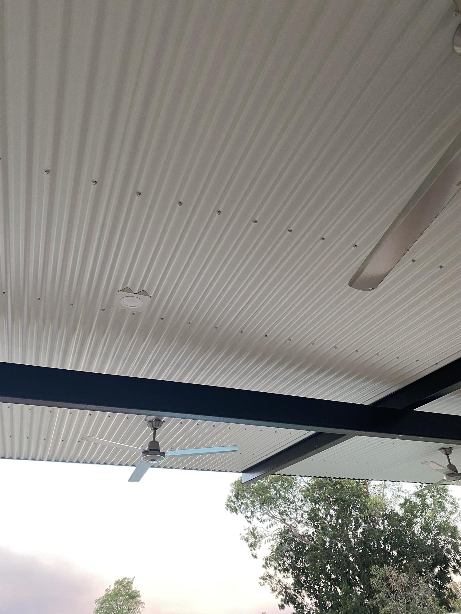 Sharon from Howard Springs, NT loves COLORBOND® steel. Patio and pergola made from COLORBOND® steel in Surfmist®