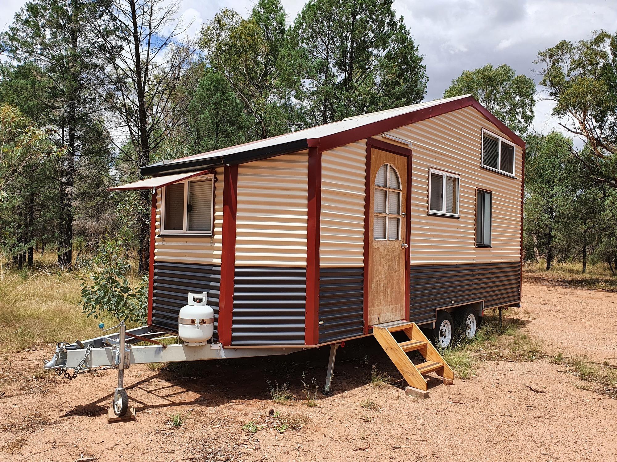 Judi from Dubbo, NSW loves COLORBOND® steel. Mobile tiny house Roofing, Guttering & Fascia, Walling cladding made from COLORBOND® steel in colours Classic Cream™, Manor Red® and Monument®