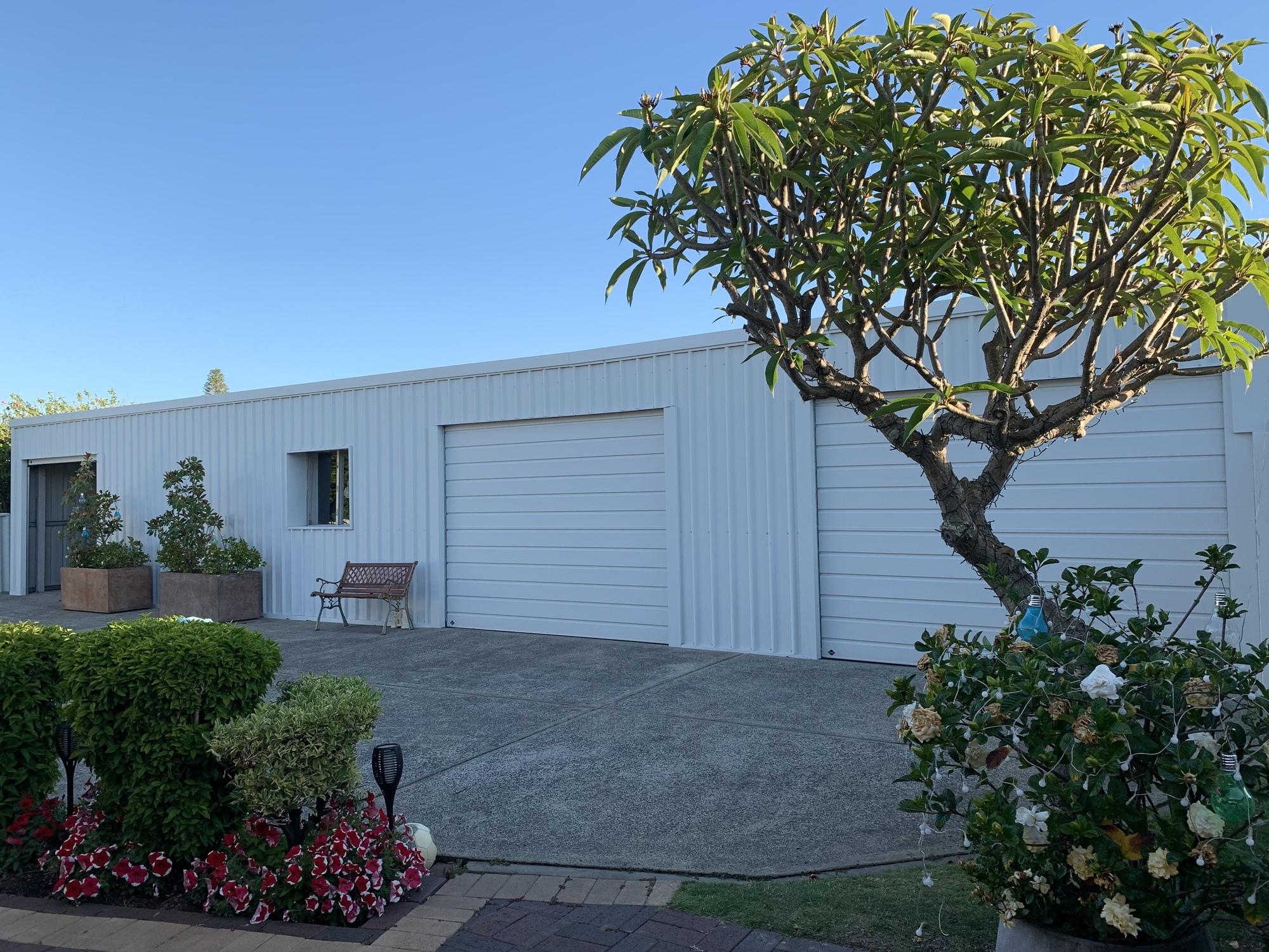 Tracy from Bunbury, WA loves COLORBOND® steel. Guttering & Fascia, Garage Doors, Sheds made from COLORBOND® steel in colour Surfmist® Matt