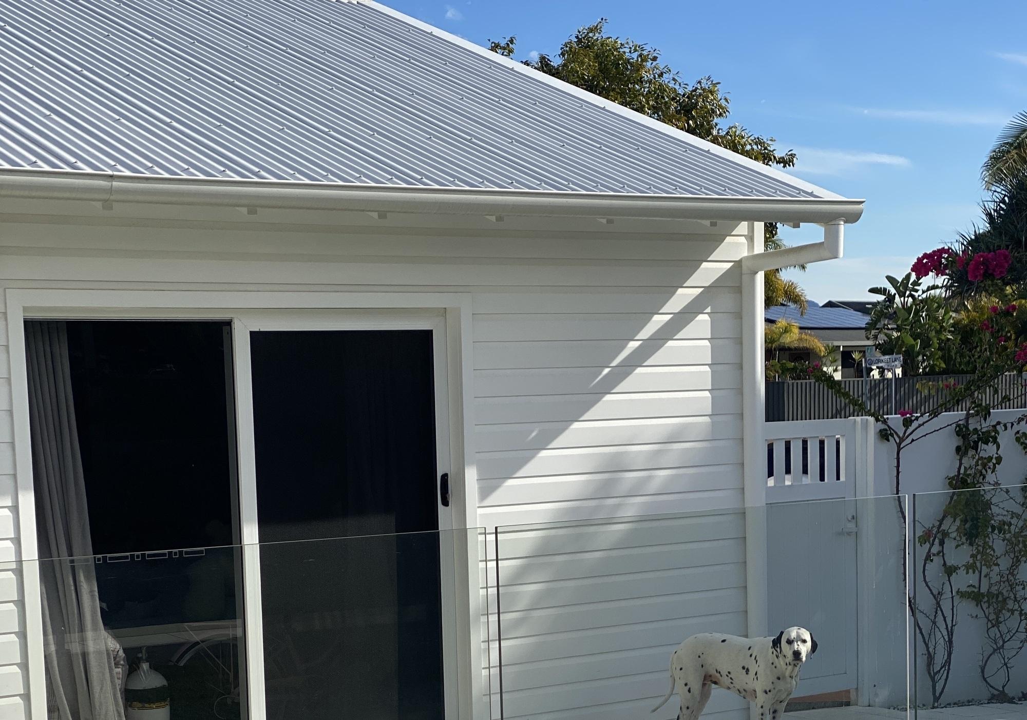Adrian from Burliegh Waters, QLD loves COLORBOND® steel. Coastal themed home Roofing, Guttering & Fascia made from COLORBOND® steel in colours Surfmist® and Paperbark®