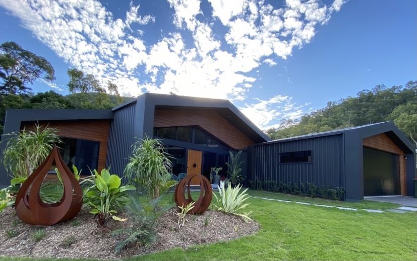Sacha from Trinity Beach, QLD loves COLORBOND® steel.  Roofing, Guttering & Fascia, Garage Doors, Walling, Fencing made from COLORBOND® steel in colours Night Sky® and Monument®