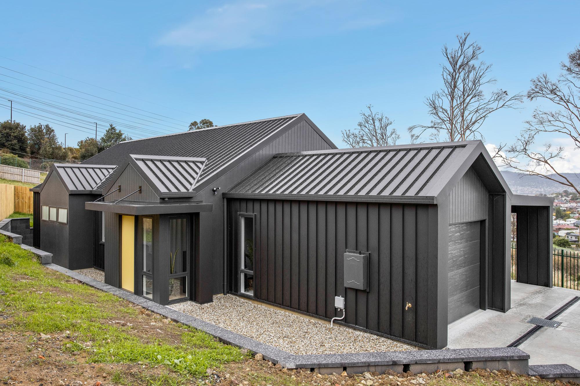 Louise from Glenorchy, TAS loves COLORBOND® steel. Roofing, Guttering & Fascia, Walling made from COLORBOND® steel in Monument® and Monument® Matt