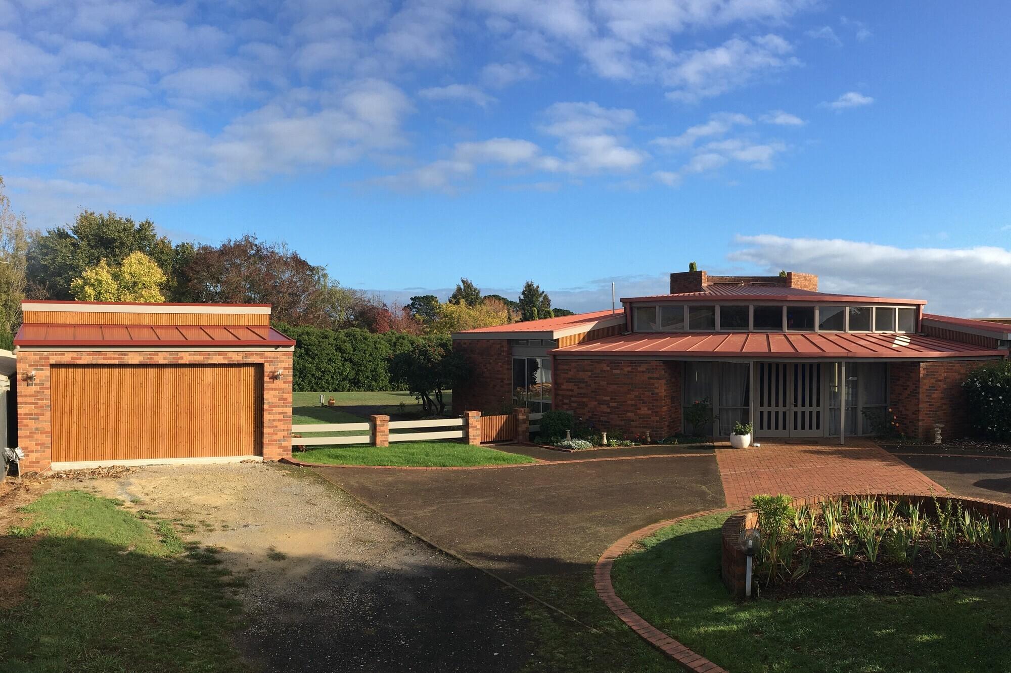 Neville from Thorpdale, VIC loves former church remodel. Roofing, Guttering & Fascia, Sheds, Patio & Pergola COLORBOND® steel in Colours Manor Red®, Basalt® and Shale Grey®