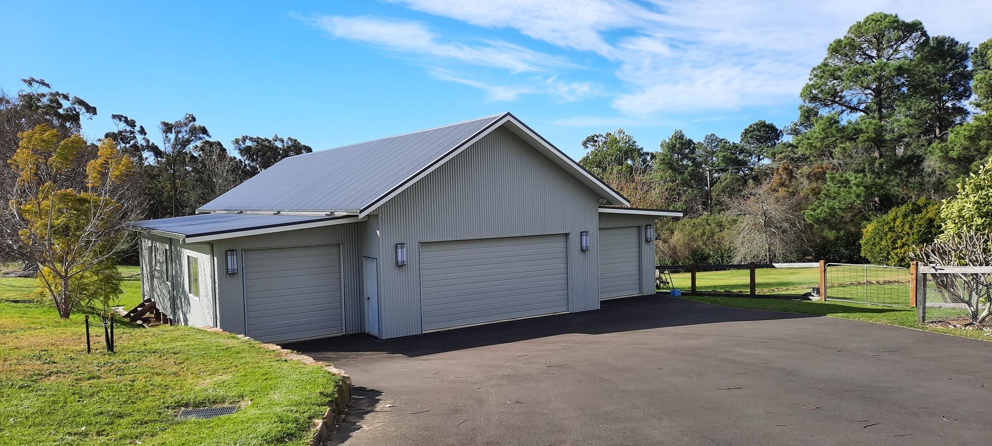 Caroline from Arcadia, NSW loves COLORBOND® steel Roofing, Guttering & Fascia, Garage Doors, Walling in colours Ironstone® Shale Grey® and Surfmist®