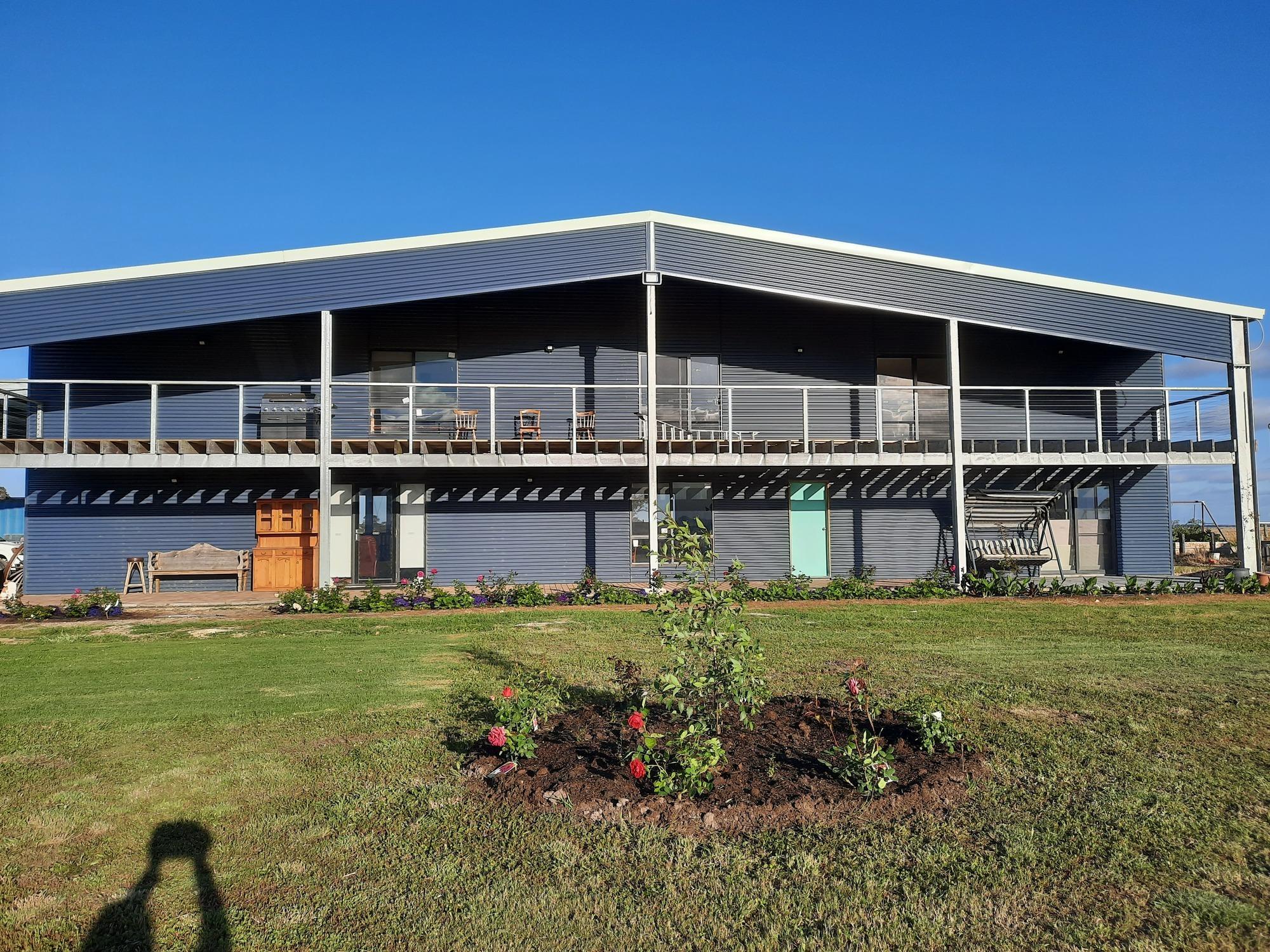 Benni from Tarpeena, SA loves COLORBOND® steel. Guttering & Fascia, Walling, Patio & Pergola made from COLORBOND® steel in the colours Deep Ocean® and Surfmist® Matt