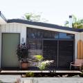 Simon and Ash Vos selected COLORBOND® steel Matt in the colour Shale Grey® for their Palm Springs inspired home.