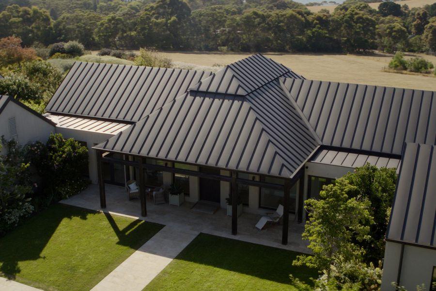 Reid House.  Roofing made from COLORBOND® steel in colour Monument® in a standing seam profile.