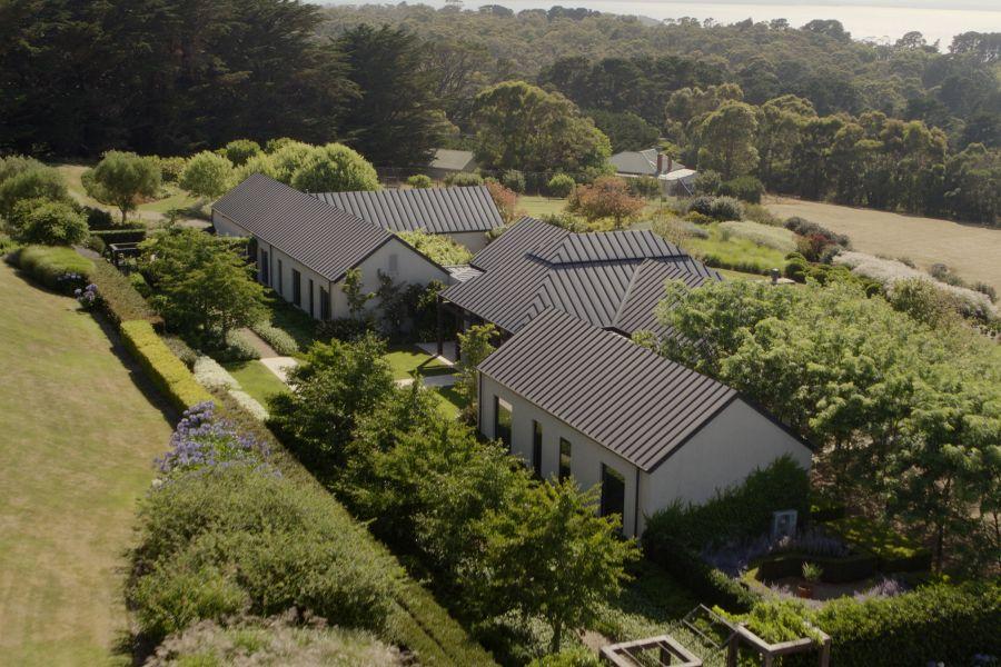 Reid House.  Roofing made from COLORBOND® steel in colour Monument® in a standing seam profile.